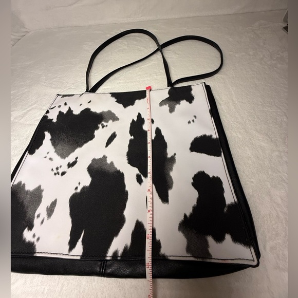 Cowprint Black and White Tote Bag with a Red Interior - Picture 6 of 7
